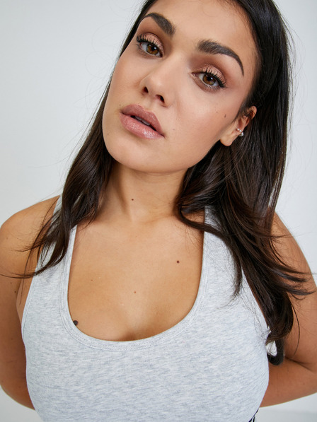 Guess Světle šedá žíhaná sportovní podprsenka Guess Aline
